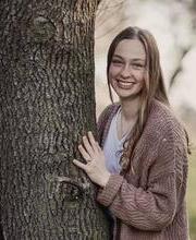 maddie_with_tree.jpg Maddie